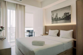 Good and Homey Studio at Pacific Garden Alam Sutera Apartment By Travelio